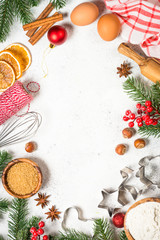 Christmas baking background on white table.