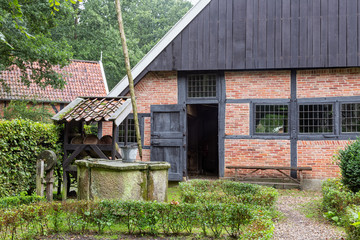 Dutch rural open-air museum with shed and water well