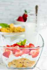 Tasty healthy breakfast with fruits and yogurt.