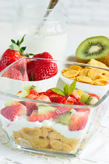 Tasty healthy breakfast with fruits and yogurt.
