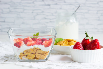 Tasty healthy breakfast with fruits and yogurt.