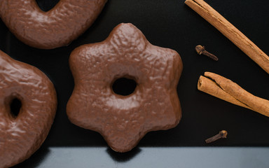 traditional german christmas chocolate gingerbread lebkuchen with cinnamon sticks and clove