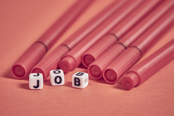 Red pens show the word work, job