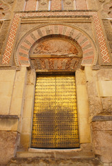 Golden door of  Mosque–Cathedral of Cordoba Assumption, Spain