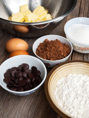 Brownies ingredients on wooden table. Top view with copy space.