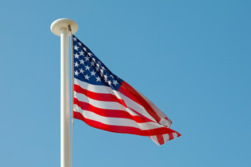 American Flag against blue sky