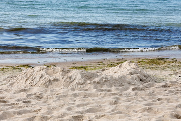 Beach and remains of a sand castle