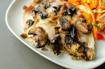 Chicken breast with sliced mushrooms, ham, in cheese sauce with pasta salad