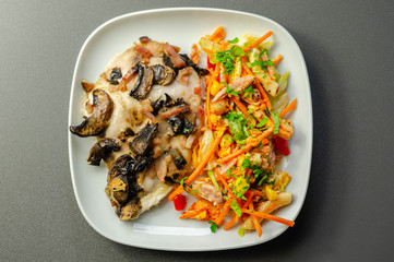 Chicken breast with sliced mushrooms, ham, in cheese sauce with pasta salad