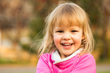 happy laughing cute little girl portrait