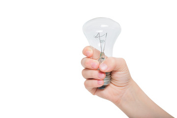 Glowing incandescent lamp in a child's hand isolate on a white background
