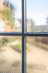 Condensation on glass panes in a single glazed window