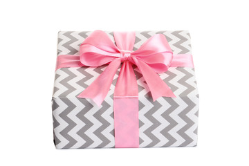 gift box with pink bow on white