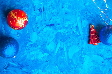 Christmas-tree decorations balls on a blue background
