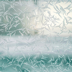 Macro photography of a window frosted by snowflakes