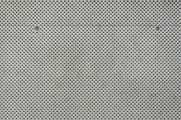 Betonmauer Sichtbeton mit negativem Noppenmuster als Schalung, teilweise verschmutzt mit Bauschmutz