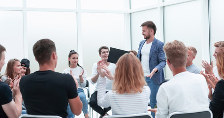 speaker talking about something at a business seminar