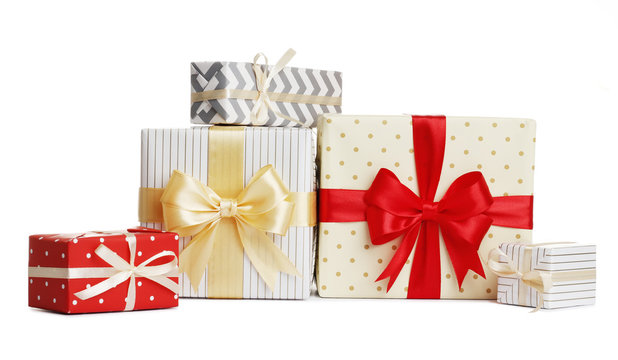 Different Christmas gift boxes on white background