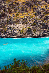 Beautiful famous bay of Sa Calobra on the island of Mallorca, Spain. Turquoise sea, rocks. Travel to the Balearic Islands.