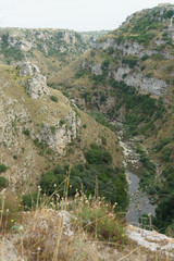 Fototapeta na wymiar the river that flows between the hills near Matera, Italy