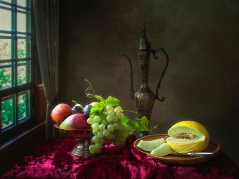 Still life with grapes and melon