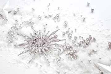 silver christmas or new year decoration on while background