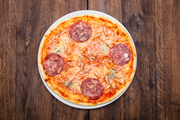 classic Italian pizza on a wooden table