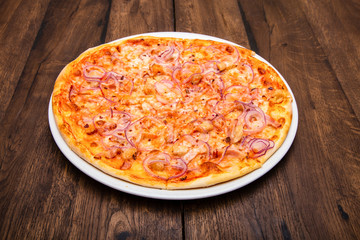 classic Italian pizza on a wooden table
