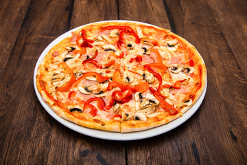 classic Italian pizza on a wooden table