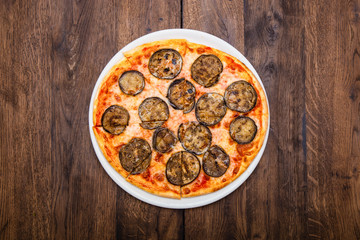 classic Italian pizza on a wooden table