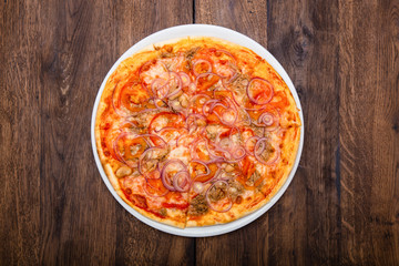 classic Italian pizza on a wooden table