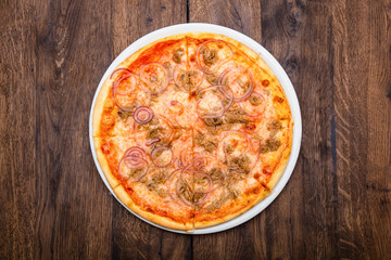 classic Italian pizza on a wooden table