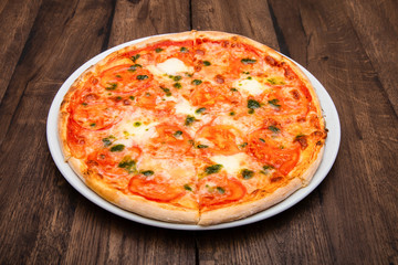 classic Italian pizza on a wooden table