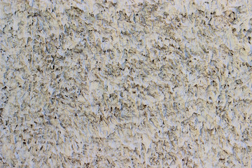 Texture of stucco used as an exterior coating on a building
