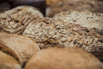 Fresh bread on the counter in the store, close-up .
