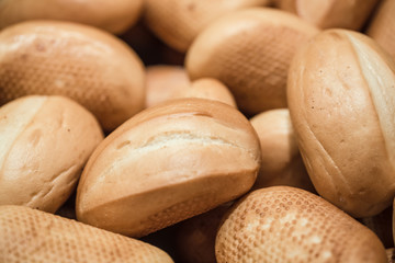 Fresh bread on the counter in the store, close-up .
