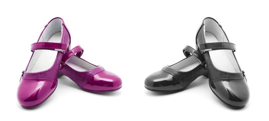 Pink and black shine leather girl shoes isolated on white