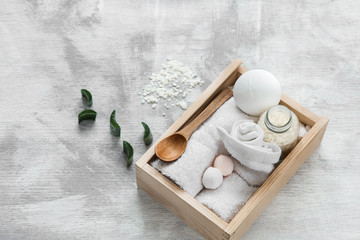 Fototapeta na wymiar Spa skin care items in wooden box .