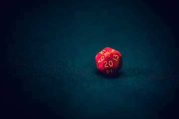 old 20 sided red die for games 