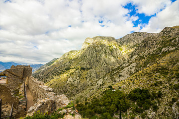 Montenegro, Kotor, 09 October, 2019. View of Bas-relief (low relief) on old Kotor walls of the old town and ancient walls of Kotor Fort (St John Fortress) and Chapel of Our Lady of Salvation