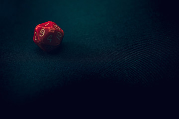 old 20 sided die with 1 face up