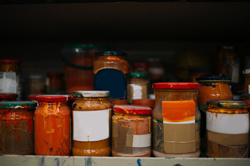 Old paint cans with dust