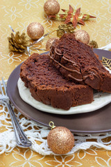 Fototapeta na wymiar Pieces of Chocolate Banana Cake Soft toned. Selective focus. New Year and Christmas concept.