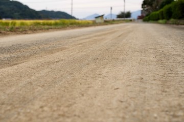 Fototapeta premium 田舎の道路 農道 背景