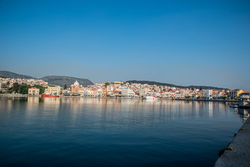 Fototapeta na wymiar Mytilene port early in the morning as seen from the boat, in the island of Lesvos, Greece