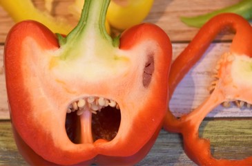 two halves of red and yellow paprika