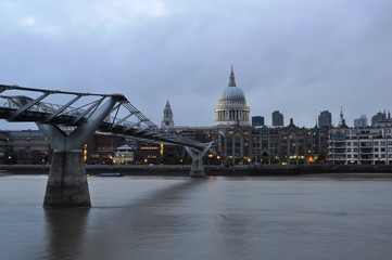 Fototapeta na wymiar Millennium Bridge across the River Thames. Beautiful view.