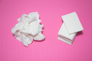 Used and new tissues on pink background. Concept of sick, flu and cold, crying, untidy, masturbation.