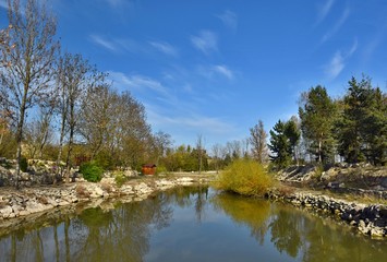 Fototapeta na wymiar small lake in garden park