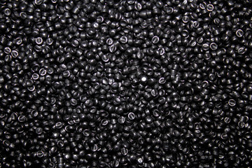 The plane is filled with black plastic granules.